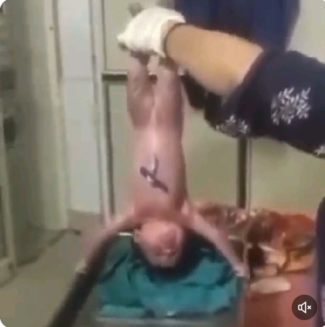 A New Born Baby Does Not Want To Let Go Of The Tray